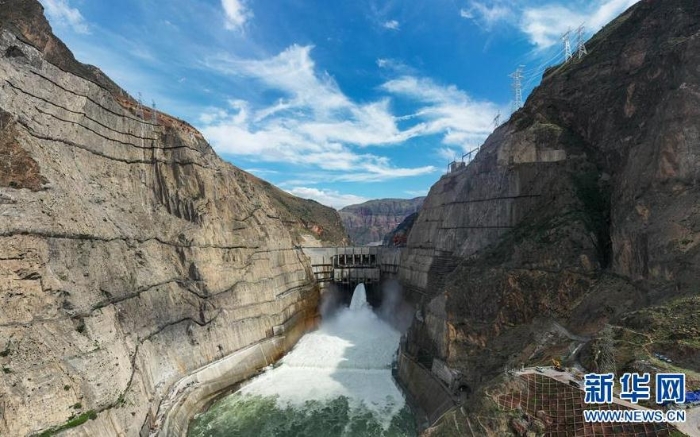 烏東德水電站大壩（6月29日攝，無(wú)人機(jī)照片）。新華社記者 胡超 攝