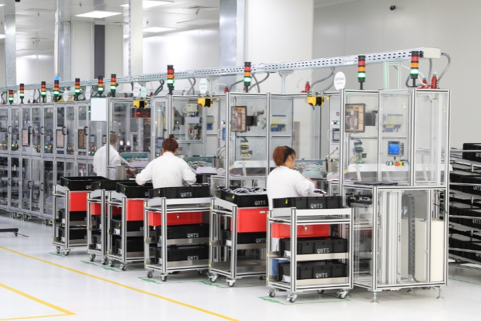 圖為駐區(qū)企業(yè)生產(chǎn)現(xiàn)場。